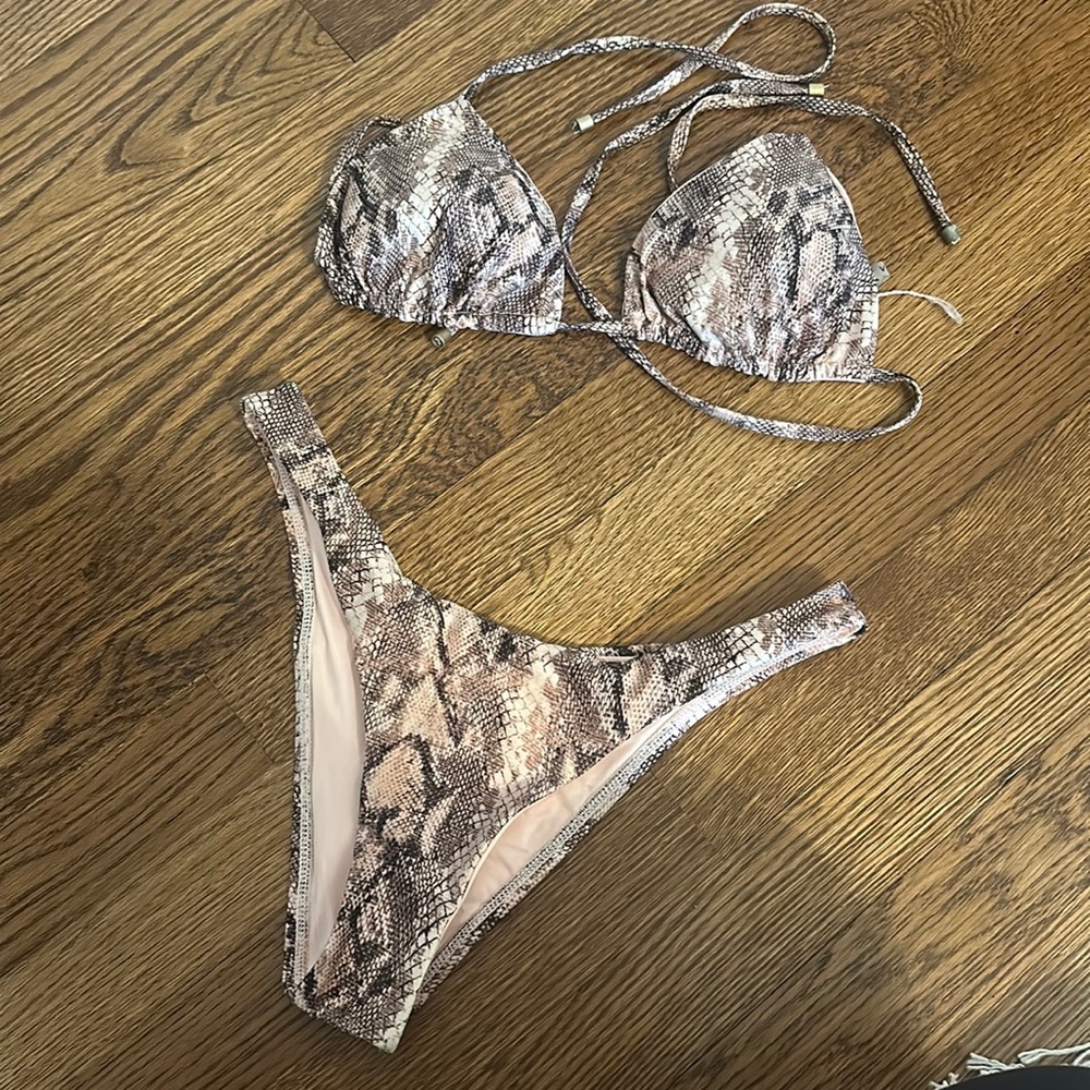 Vitamin A Snakeskin bikini. Triangle top and high leg bottoms. Worn once